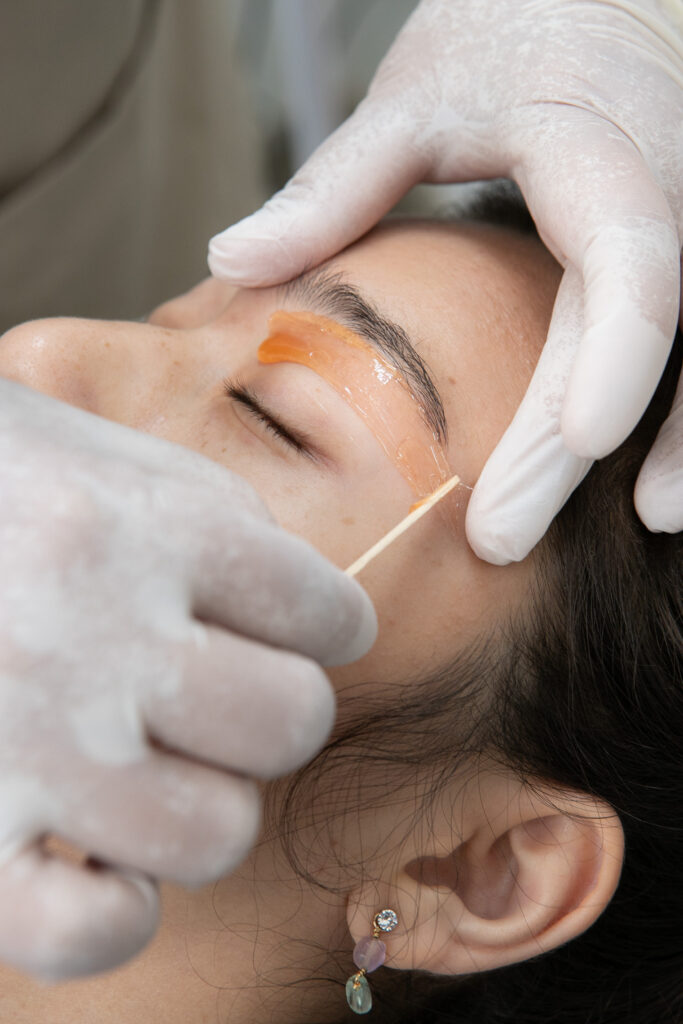 Facial waxing with hard wax at Bangkok Glow Waxing Studio
